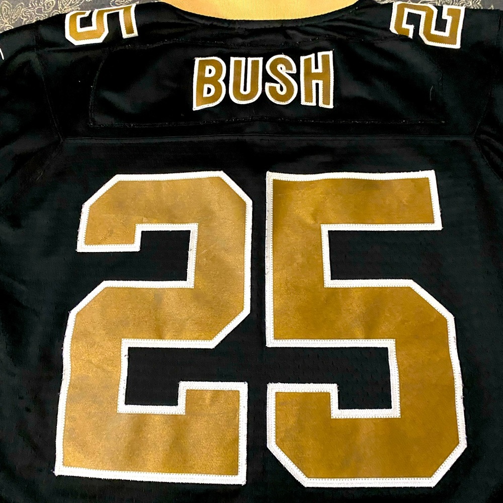 Reebok Saints football jersey , Reggie Bush, #25, youth large 14-16 Black gold